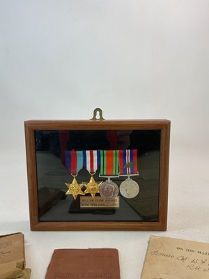 Lot 60 - A WWII MID medal group and associated...