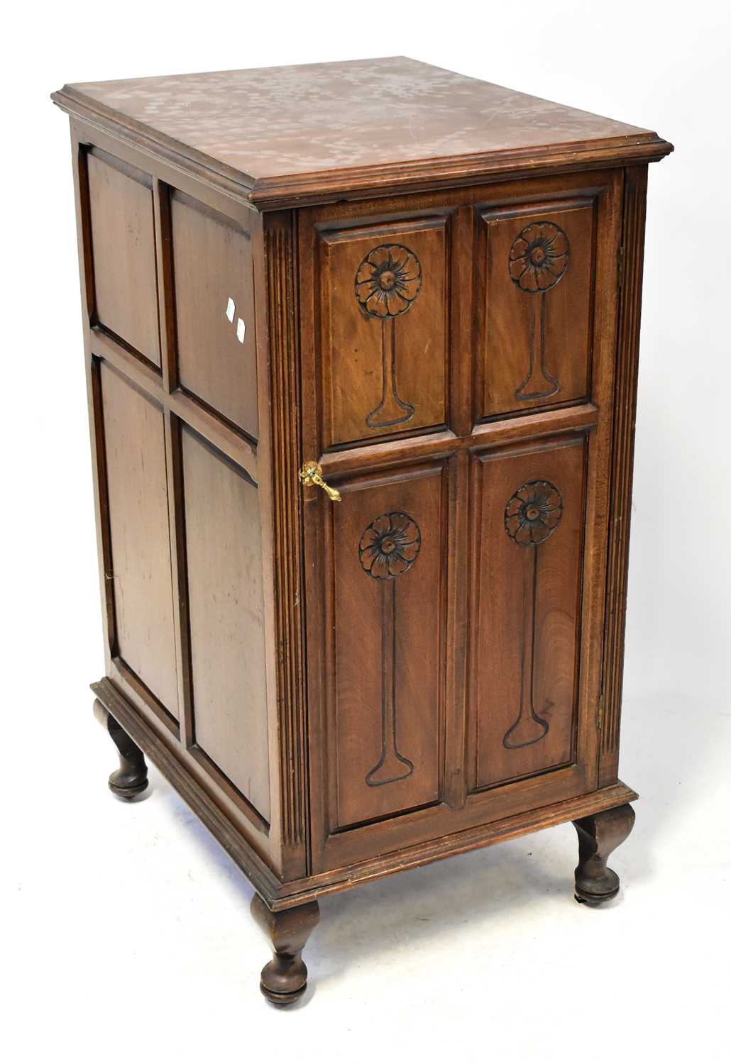 Lot 21 - An early 20th century walnut single-door side...