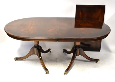 Lot 28 - A Regency-style mahogany twin-pedestal...