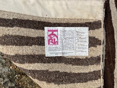 Lot 61 - RALO CARPET; a modern machine made grey and...