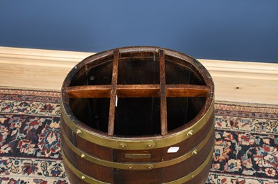 Lot 2818 - A brass bound teak barrel shaped stick stand,...