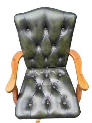 Lot 50 - A reproduction green leather Chesterfield type...