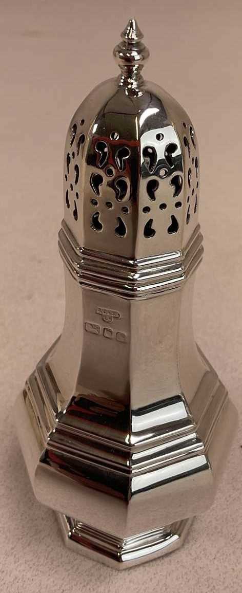 Lot 1080 - An Elizabeth II hallmarked silver sugar caster...