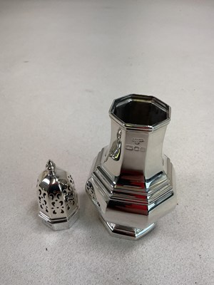 Lot 1080 - An Elizabeth II hallmarked silver sugar caster...