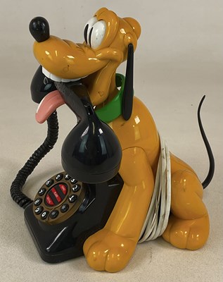 Lot 28 - DISNEY; a Pluto landline push button telephone,...
