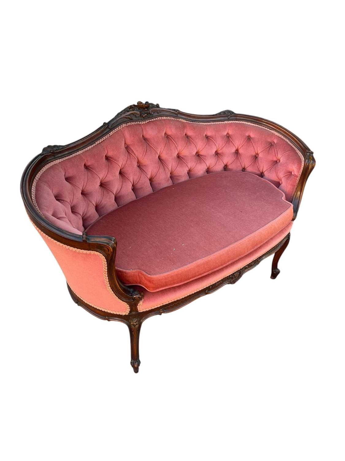 Lot 2123 - A Victorian carved walnut two seater salon...