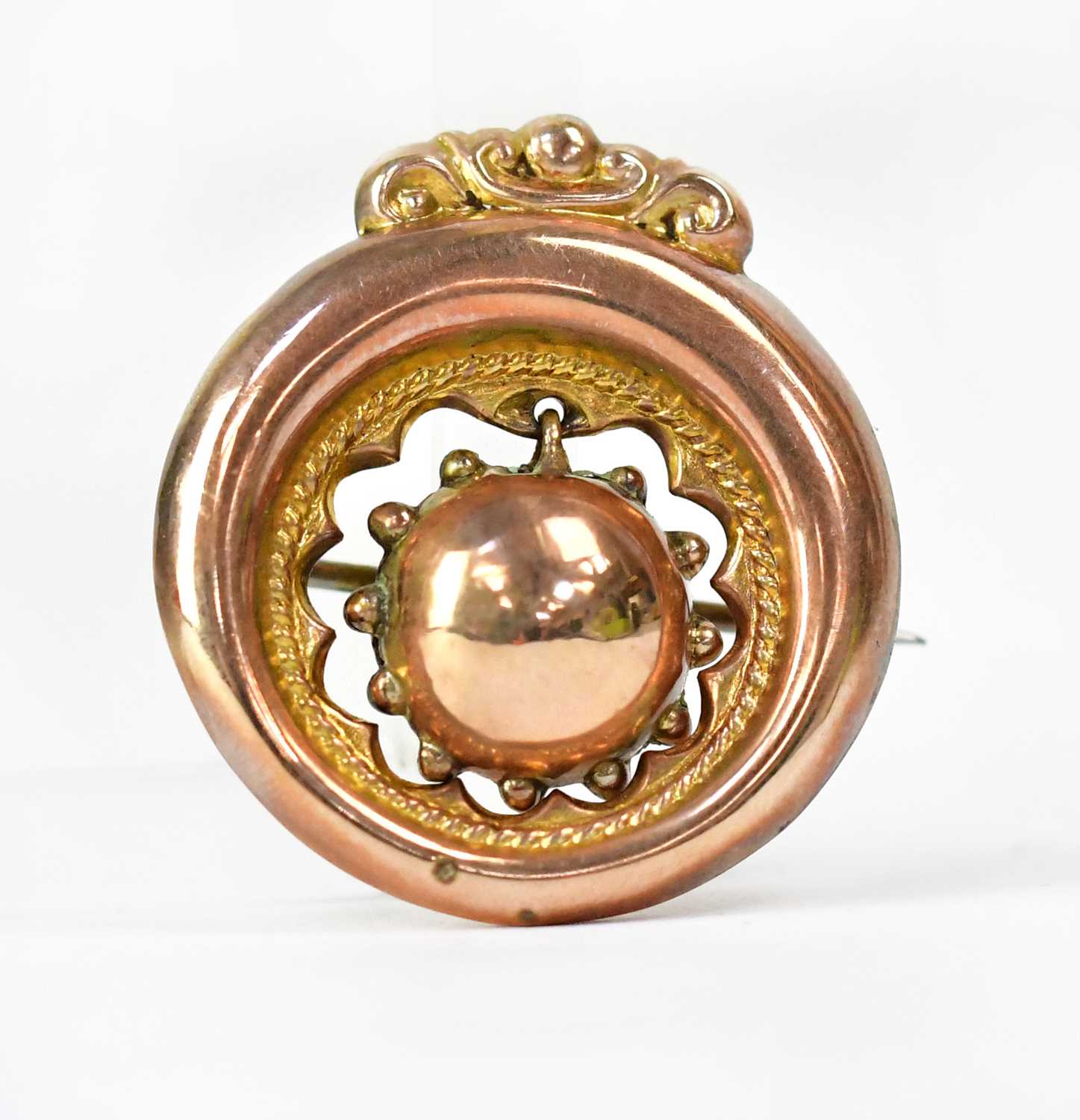 Lot 830 - A Victorian 10ct Welsh gold circular brooch,...