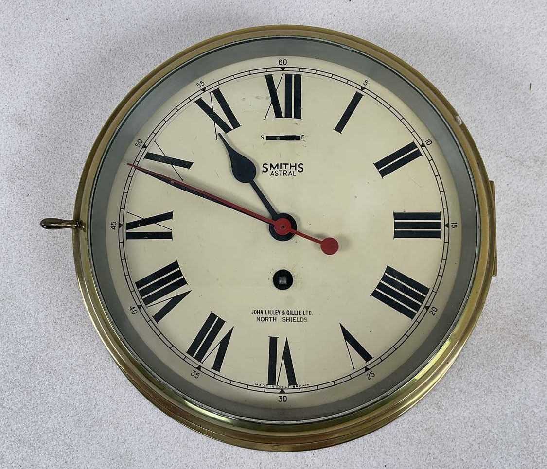 Lot 644 - SMITHS; an Astral brass ship's clock, retailed...