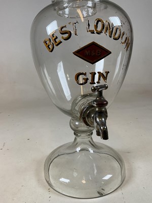 Lot 105 - A large advertising clear glass gin dispenser...