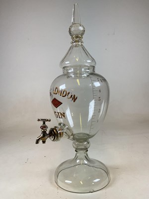 Lot 105 - A large advertising clear glass gin dispenser...