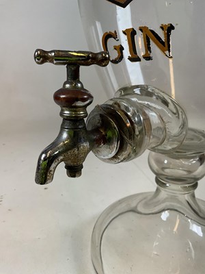 Lot 105 - A large advertising clear glass gin dispenser...