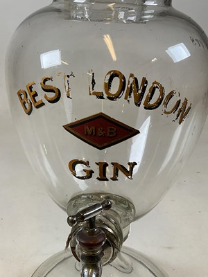 Lot 105 - A large advertising clear glass gin dispenser...