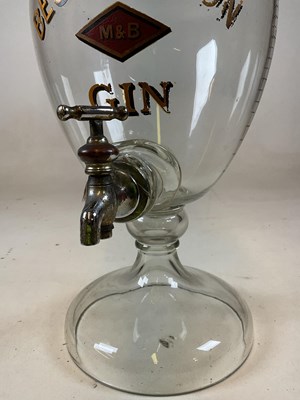 Lot 105 - A large advertising clear glass gin dispenser...
