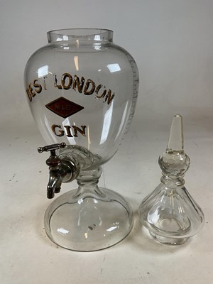 Lot 105 - A large advertising clear glass gin dispenser...
