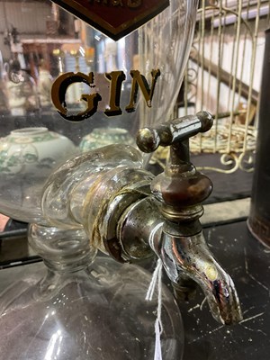 Lot 105 - A large advertising clear glass gin dispenser...