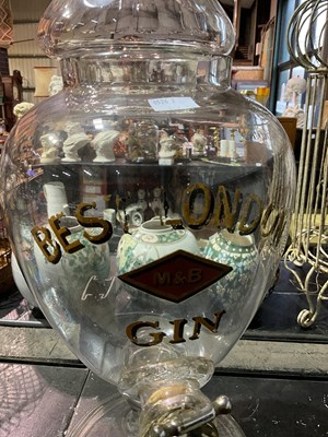 Lot 105 - A large advertising clear glass gin dispenser...
