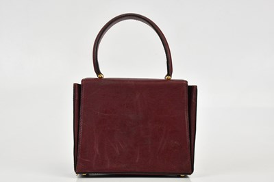 Lot 680 - CARTIER; a Must de Cartier 2C logo red...