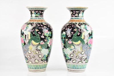 Lot 1038 - A near pair of Chinese Famille Noir porcelain...