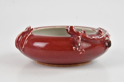 Lot 1009 - A Chinese Sang de Boeuf brush washer, relief...