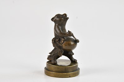 Lot 1087 - A Japanese bronze figure of a standing tanuki...