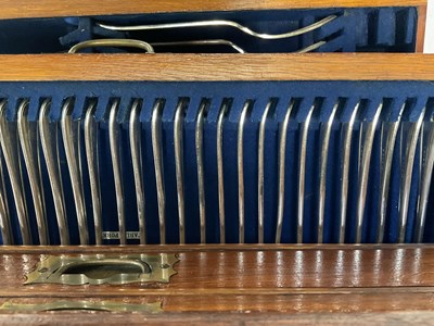 Lot 1 - A late 19th century oak table canteen of...
