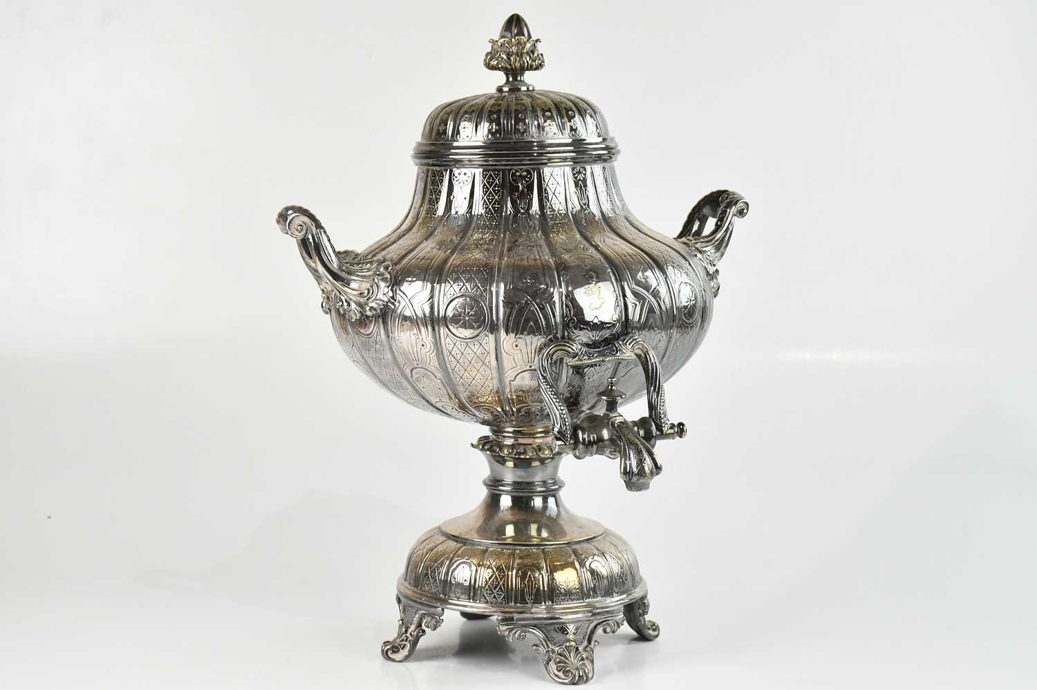 Lot 23 - A large Victorian silver plated tea urn,...