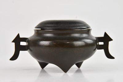 Lot 1018 - A late 19th century Chinese bronze twin...