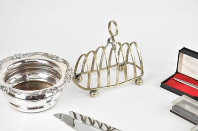 Lot 28 - A late 19th century silver plated wine coaster,...