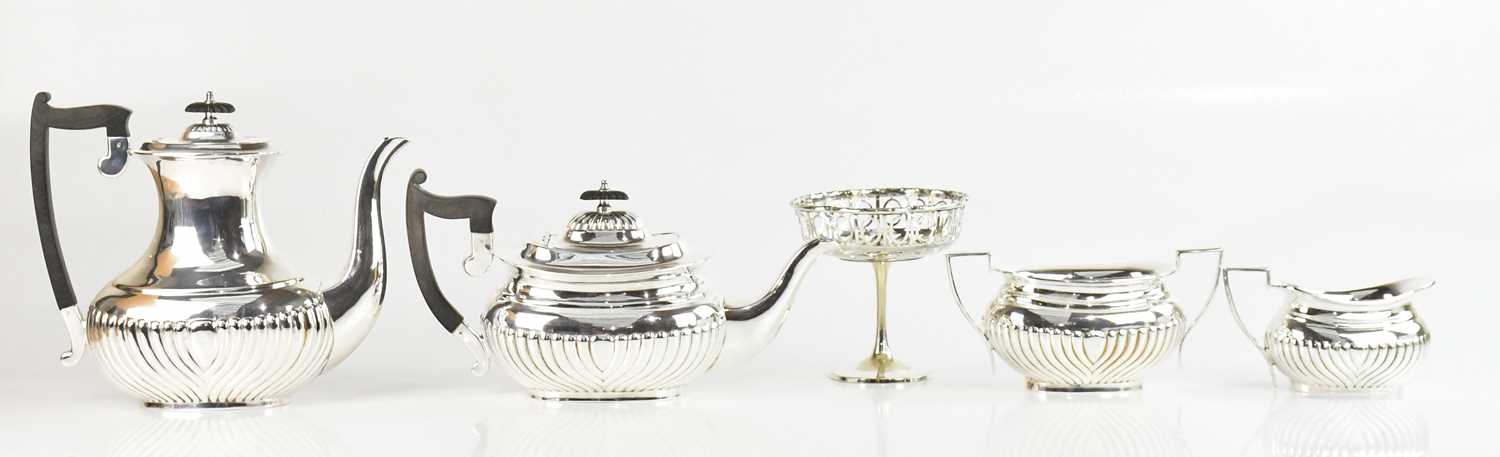 Lot 29 - A silver plated four piece tea service with...