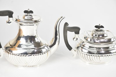 Lot 29 - A silver plated four piece tea service with...