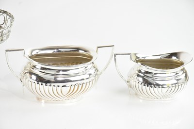 Lot 29 - A silver plated four piece tea service with...
