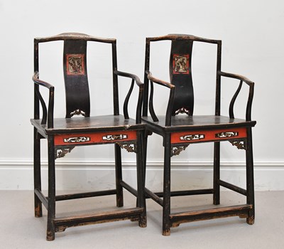 Lot 1007 - A pair of Chinese carved and stained elm...