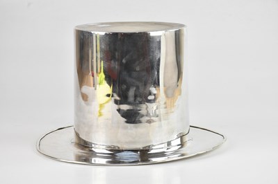 Lot 7 - A novelty silver plated wine cooler modelled...