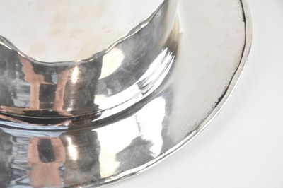 Lot 7 - A novelty silver plated wine cooler modelled...