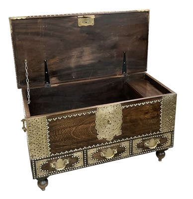 Lot 16 - A reproduction African carved hardwood...