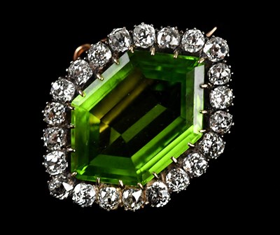 Lot 147 - A yellow and white metal diamond and peridot...