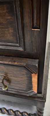Lot 12 - An early 20th century oak bureau bookcase in...