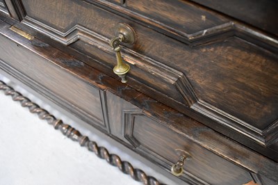 Lot 12 - An early 20th century oak bureau bookcase in...