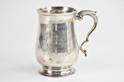 Lot 359 - A George III hallmarked silver mug, with later...