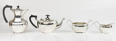 Lot 450 - A hallmarked silver matched four piece tea...