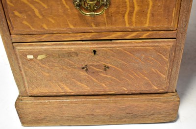 Lot 47 - An Edwardian oak partners' desk, with an...