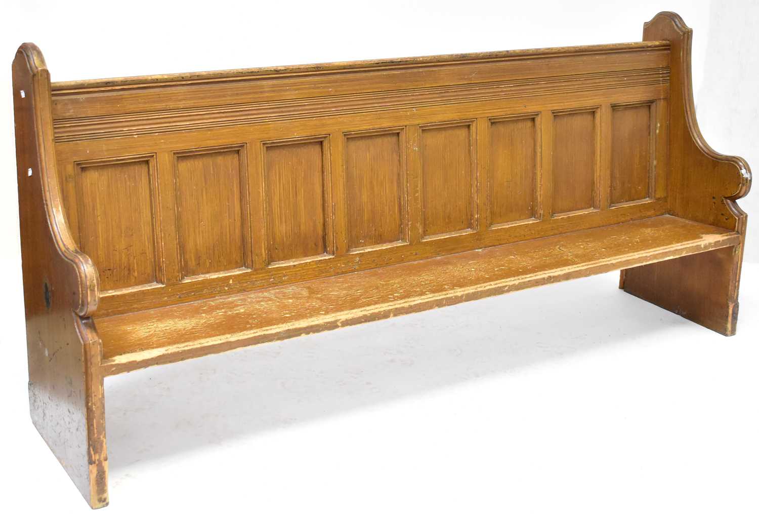 Lot 2 - A pitch pine church pew with panelled back,...