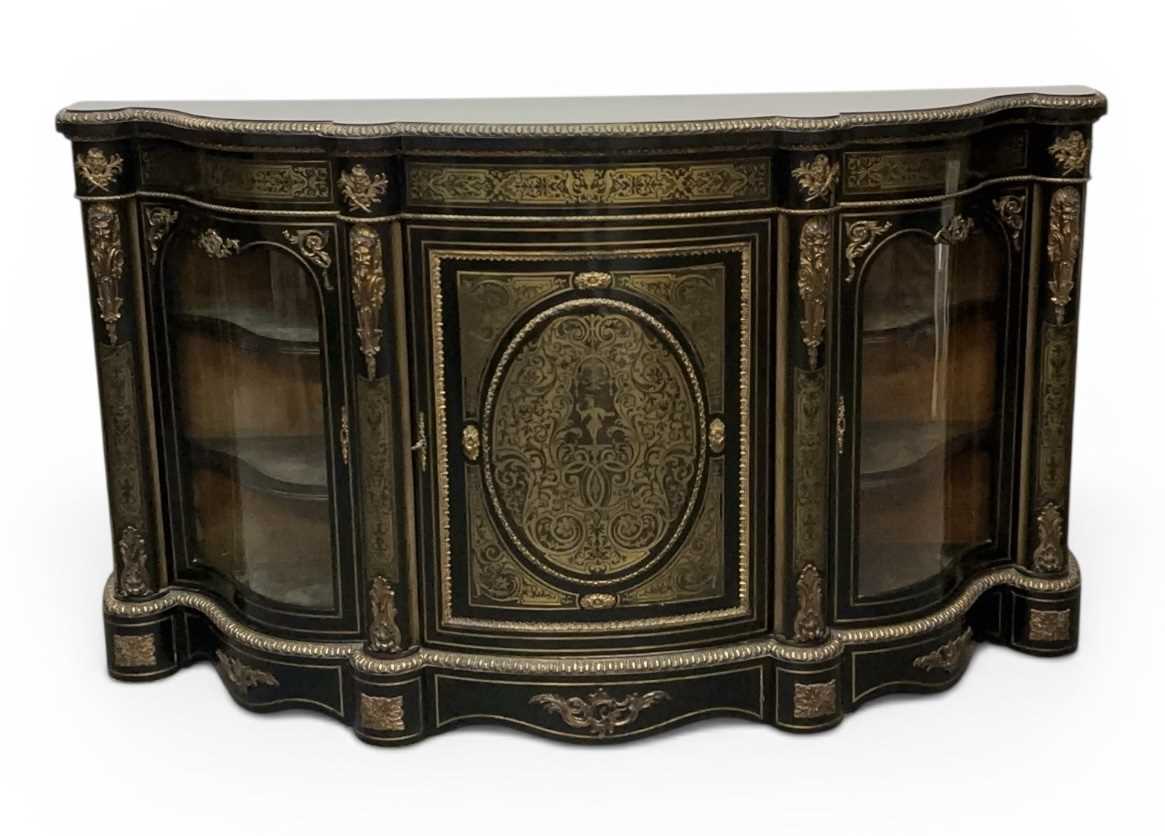 Lot 3 - A late 19th century French ebony gilt metal...