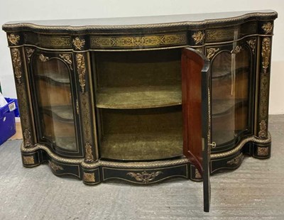 Lot 3 - A late 19th century French ebony gilt metal...