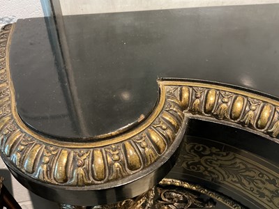 Lot 3 - A late 19th century French ebony gilt metal...
