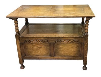 Lot 47 - An early 20th century carved oak monk’s bench,...