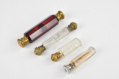 Lot 2251 - Four late Victorian and later perfume bottles...