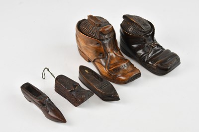 Lot 2252 - Two novelty inkwells formed as shoes, possibly...
