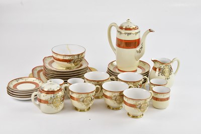 Lot 1377 - MEITO CHINA; a cream ground tea set,...
