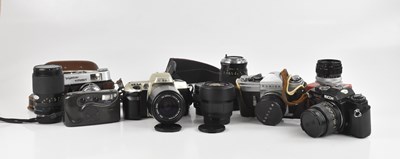 Lot 121 - A collection of cameras and lenses, to include...